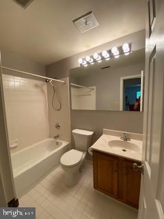 586 Wild Flower Glade, Annapolis, MD 21409 - full bath featuring toilet, vanity, tile patterned flooring, and shower / washtub combination