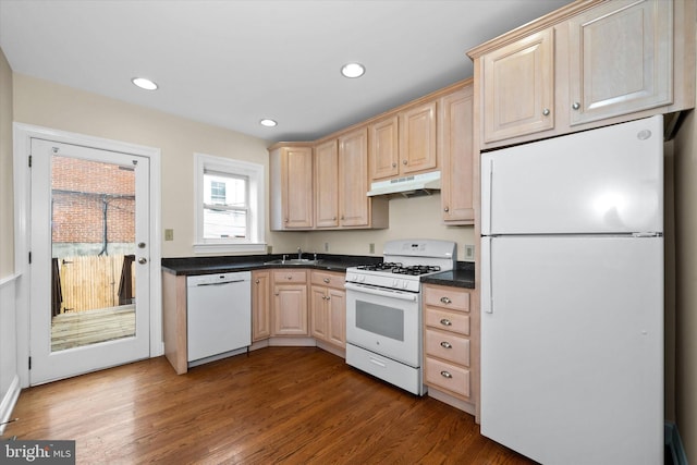 1718 N Scott St, Wilmington, DE 19806 - kitchen featuring white appliances, light brown cabinets, dark countertops, wood finished floors, and recessed lighting