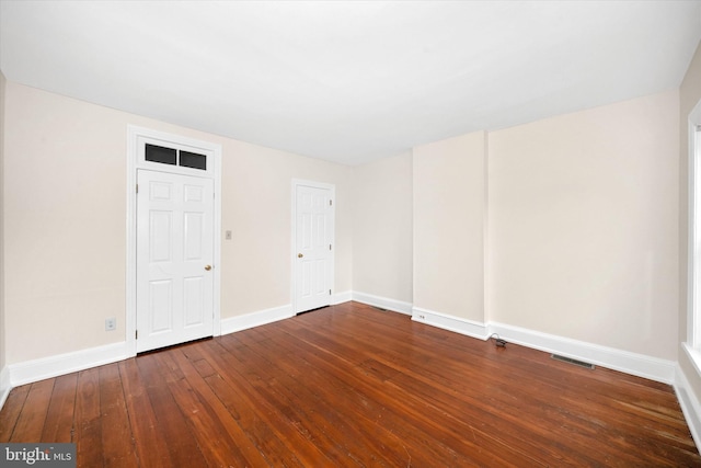 1718 N Scott St, Wilmington, DE 19806 - empty room featuring hardwood / wood-style floors and baseboards