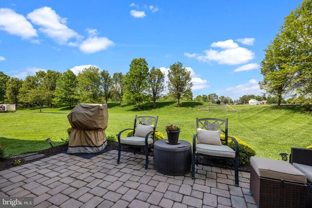 view of patio with a grill