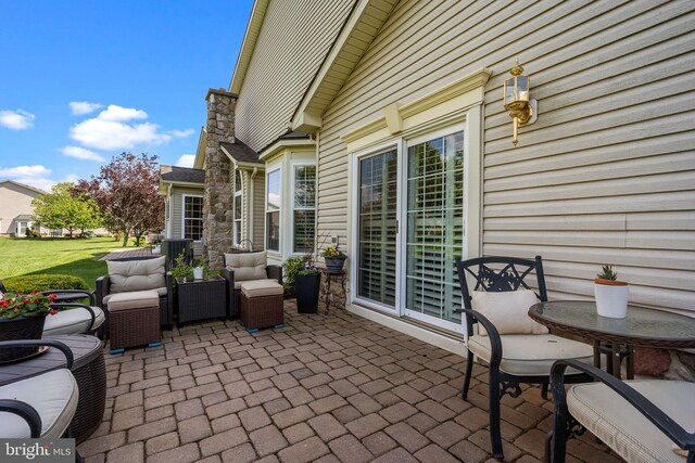 view of patio / terrace with an outdoor hangout area