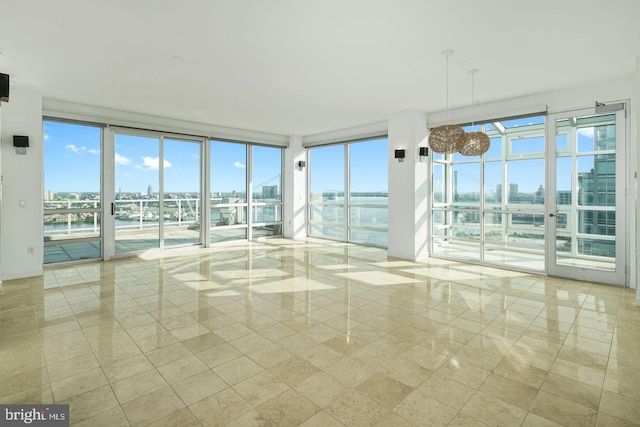 unfurnished sunroom featuring plenty of natural light