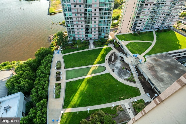 bird's eye view of apartment complex / building and a large body of water