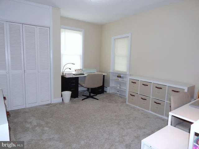 home office featuring carpet and baseboard heating