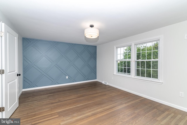 203 Shenandoah Rd, Cinnaminson, NJ 08077 - spare room with baseboards and wood finished floors