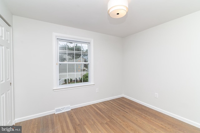 203 Shenandoah Rd, Cinnaminson, NJ 08077 - unfurnished bedroom with wood finished floors, baseboards, and a closet