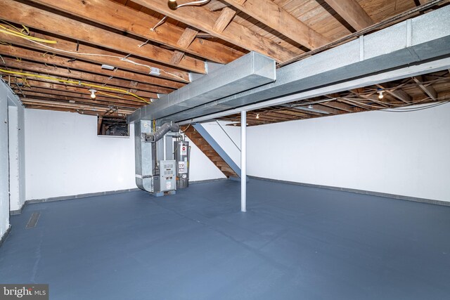 203 Shenandoah Rd, Cinnaminson, NJ 08077 - below grade area with gas water heater, stairway, and heating unit