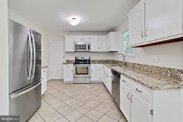 4785 Catterick Ct, Fairfax, VA 22032 - kitchen featuring appliances with stainless steel finishes, a sink, and white cabinets