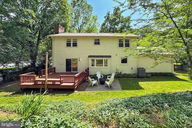 4785 Catterick Ct, Fairfax, VA 22032 - rear view of house featuring a chimney, a wooden deck, a patio area, and central AC unit