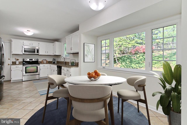 4785 Catterick Ct, Fairfax, VA 22032 - dining room with light tile patterned floors and baseboards