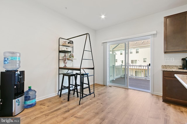 340 Shipyard Dr, Cambridge, MD 21613 - dining area featuring light wood-style floors and baseboards