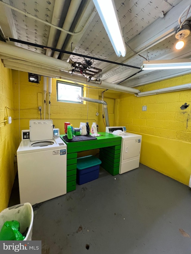 732 Melon Pl Unit D, Philadelphia, PA 19123 - basement featuring independent washer and dryer and concrete block wall