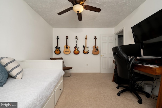 4783 Jaybird Ct, Waldorf, MD 20603 - bedroom with a textured ceiling, light colored carpet, an office area, a ceiling fan, and baseboards