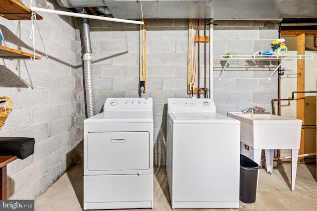 laundry room featuring independent washer and dryer