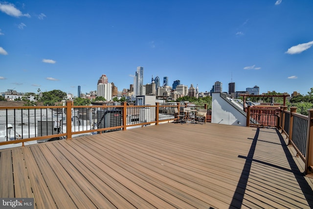 deck featuring a skyline view