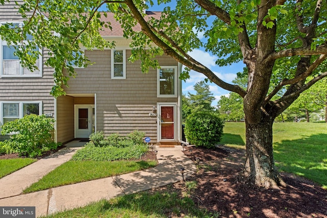 7617 Stony Creek Ln, Ellicott City, MD 21043 - townhome / multi-family property featuring a front lawn and roof with shingles
