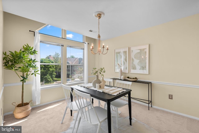 7617 Stony Creek Ln, Ellicott City, MD 21043 - dining room featuring a chandelier, carpet floors, plenty of natural light, and baseboards