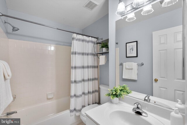 7617 Stony Creek Ln, Ellicott City, MD 21043 - full bath with toilet, shower / bath combo with shower curtain, and vanity