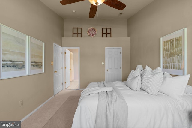 7617 Stony Creek Ln, Ellicott City, MD 21043 - bedroom featuring carpet floors, a high ceiling, a ceiling fan, and baseboards