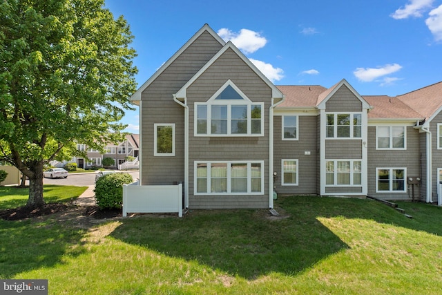 7617 Stony Creek Ln, Ellicott City, MD 21043 - rear view of house with a yard and a shingled roof