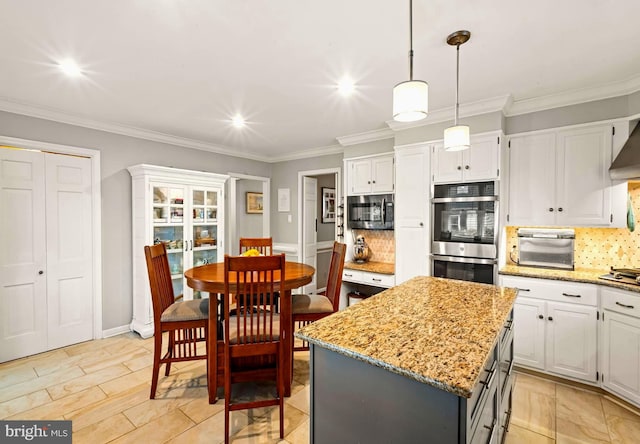94 N Woodland Ave, Woodbury, NJ 08096 - kitchen with stainless steel appliances, decorative backsplash, white cabinets, light stone counters, and recessed lighting