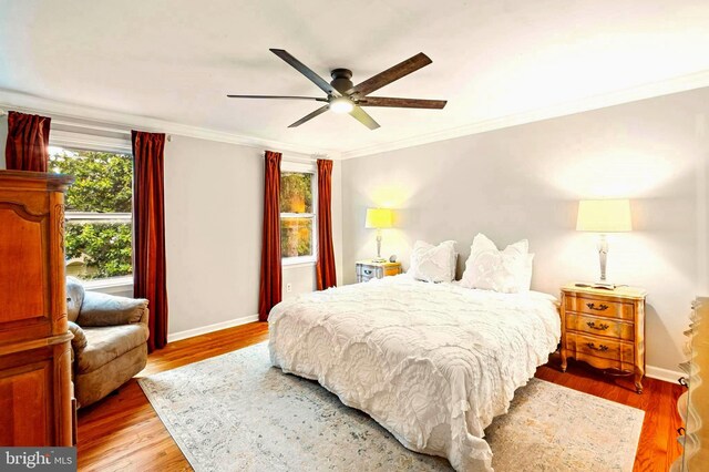 94 N Woodland Ave, Woodbury, NJ 08096 - bedroom featuring crown molding, baseboards, light wood finished floors, and a ceiling fan