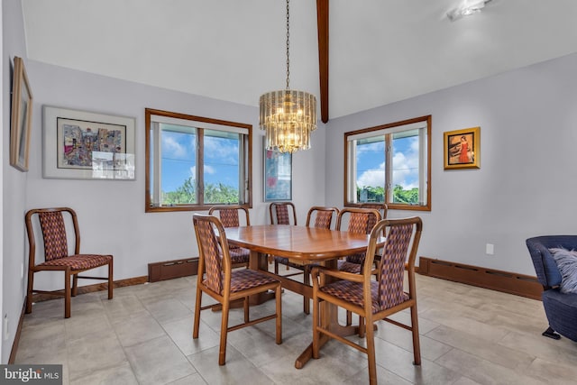 dining area with a chandelier, baseboard heating, and baseboards