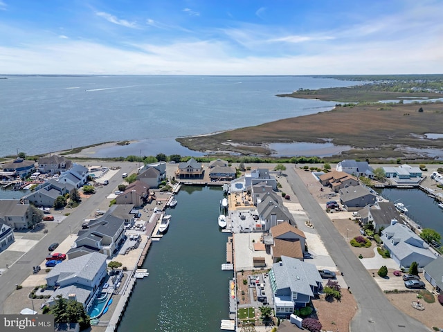 aerial perspective of suburban area with a large body of water