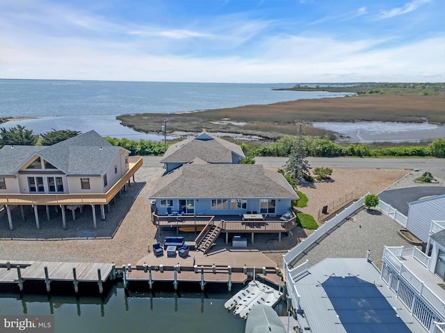 view of subject property with a large body of water
