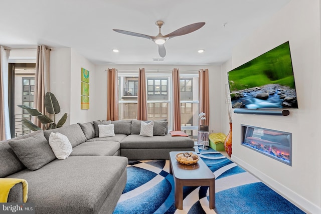 23650 Havelock Walk Ter Unit 303, Ashburn, VA 20148 - living room with baseboards, ceiling fan, and recessed lighting