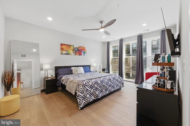 23650 Havelock Walk Ter Unit 303, Ashburn, VA 20148 - bedroom with light wood finished floors, recessed lighting, a ceiling fan, and access to outside