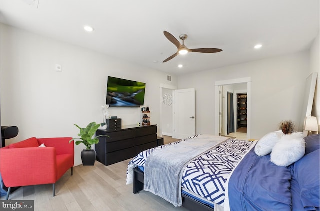 23650 Havelock Walk Ter Unit 303, Ashburn, VA 20148 - bedroom with wood finished floors, recessed lighting, a ceiling fan, and a spacious closet