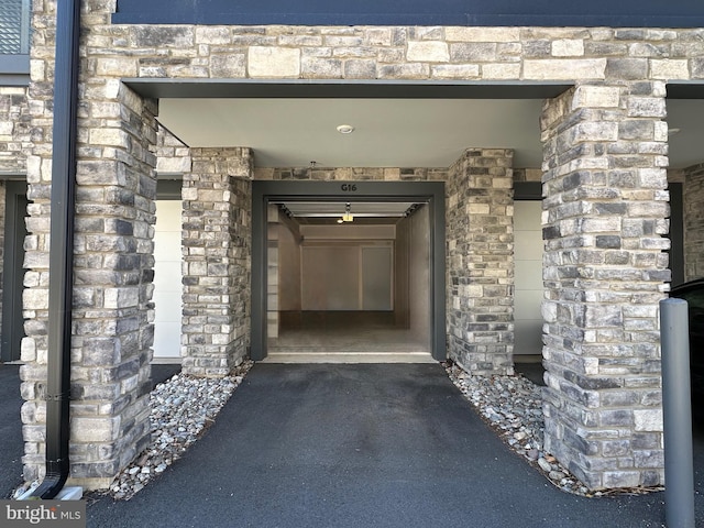 23650 Havelock Walk Ter Unit 303, Ashburn, VA 20148 - entrance to property with stone siding