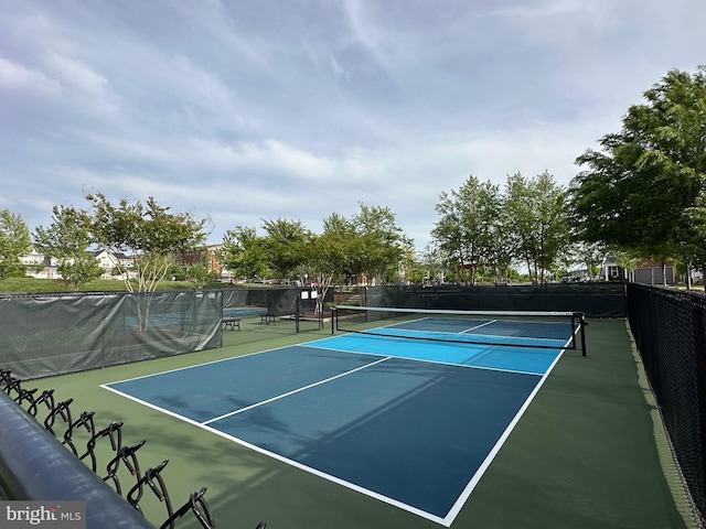 23650 Havelock Walk Ter Unit 303, Ashburn, VA 20148 - view of tennis court featuring fence