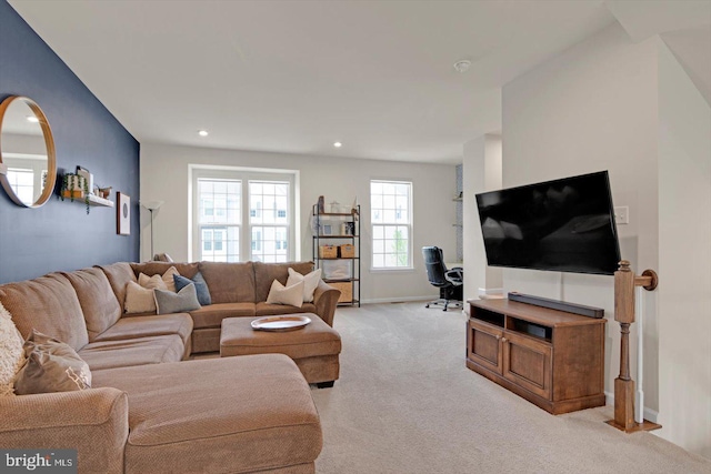 living area with light colored carpet, baseboards, and recessed lighting