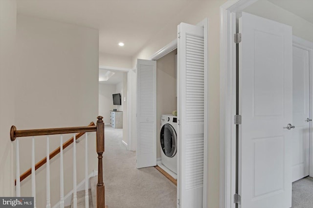 washroom with washer / dryer, light carpet, and recessed lighting