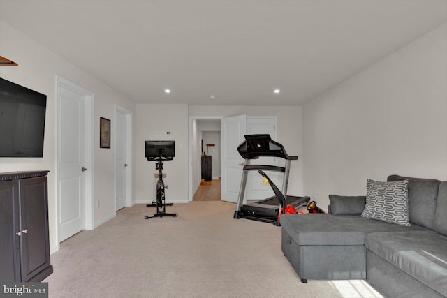 exercise area with carpet floors, recessed lighting, and baseboards
