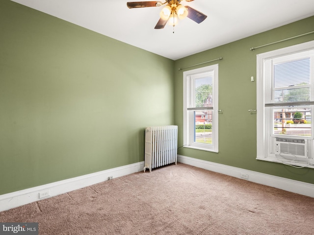 556 W Walnut St, Pottstown, PA 19464 - carpeted empty room with radiator heating unit, cooling unit, ceiling fan, and baseboards