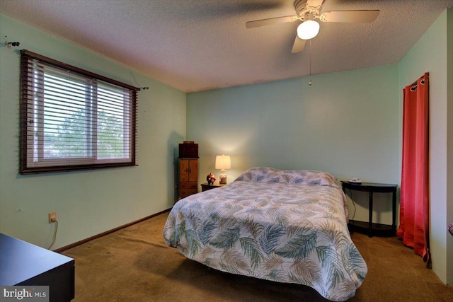 102 Harvest Ln Unit 207, Phoenixville, PA 19460 - bedroom with carpet flooring, a textured ceiling, baseboards, and a ceiling fan