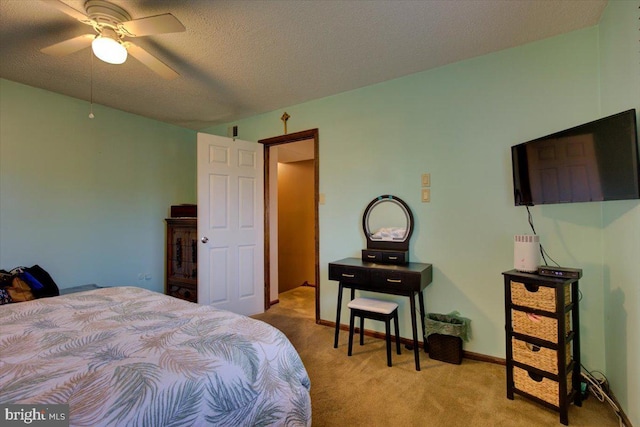 102 Harvest Ln Unit 207, Phoenixville, PA 19460 - bedroom with light carpet, a textured ceiling, and a ceiling fan