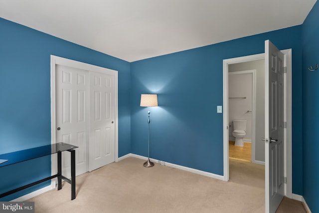 7071 Garden Walk, Columbia, MD 21044 - unfurnished bedroom with a closet, baseboards, and carpet floors