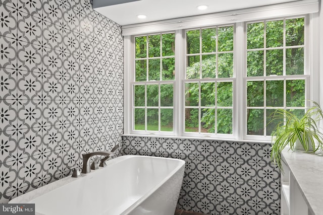7071 Garden Walk, Columbia, MD 21044 - bathroom with a freestanding bath and tile walls