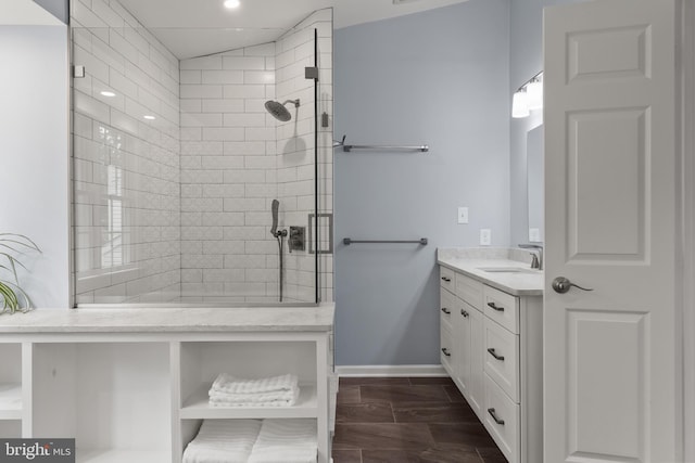7071 Garden Walk, Columbia, MD 21044 - bathroom featuring vanity, tiled shower, baseboards, recessed lighting, and wood tiled floors