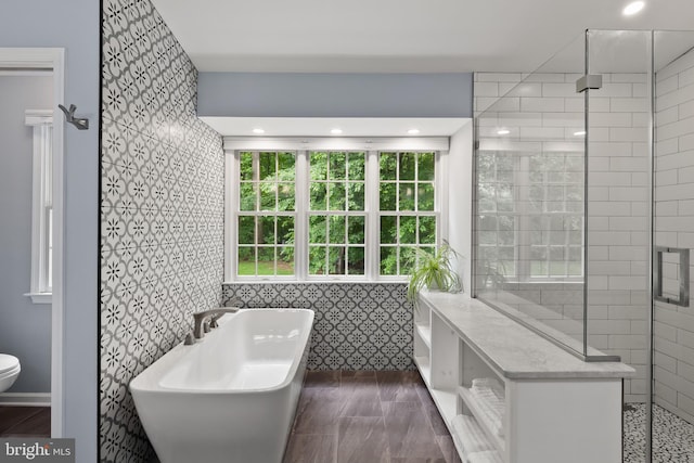 7071 Garden Walk, Columbia, MD 21044 - full bathroom with a freestanding tub, toilet, and a tile shower
