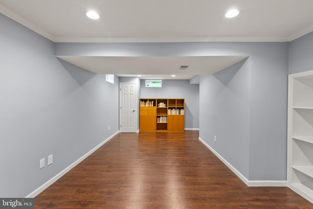 7071 Garden Walk, Columbia, MD 21044 - below grade area featuring crown molding, wood finished floors, recessed lighting, baseboards, and built in features
