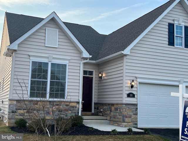 131 Hengst Farm Ln, Smyrna, DE 19977 - view of front of house featuring stone siding and roof with shingles
