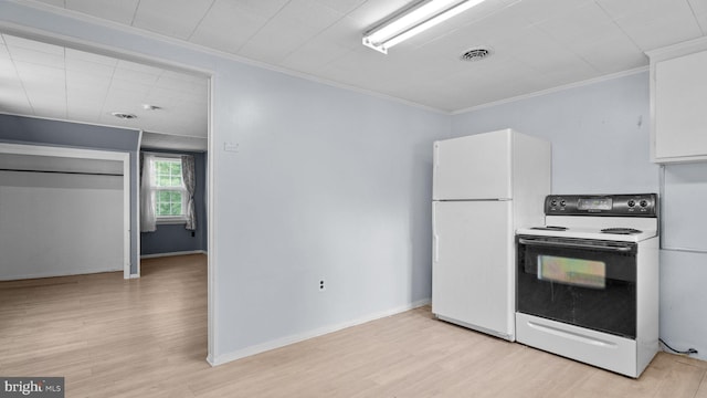 kitchen with white appliances, ornamental molding, light wood-style floors, and white cabinetry
