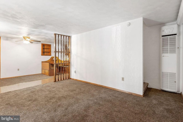 449 Carlisle St, Hanover, PA 17331 - unfurnished living room with a heating unit, carpet flooring, a ceiling fan, and baseboards