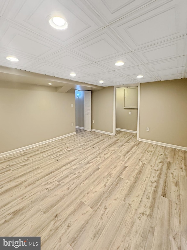 7 E Hart St, Winchester, VA 22601 - finished below grade area with recessed lighting, light wood-style floors, baseboards, and an ornate ceiling