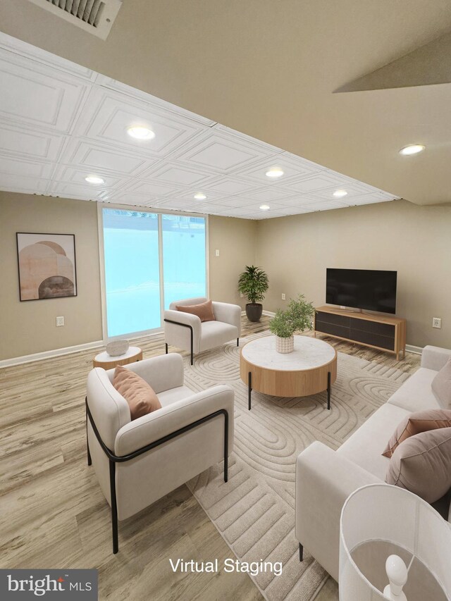 7 E Hart St, Winchester, VA 22601 - living area featuring recessed lighting, wood finished floors, and baseboards